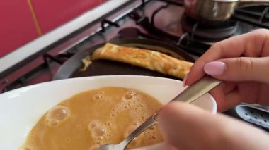 Egg Fried Omelet In Frying Hot Pan. Cooking Breakfast On Pan. Scrambled Eggs Omelette.Preparing Food Panfryed At Morning. Cracking Eggshell and Cooking Breakfast Morning. Frying Omelette Yolk .