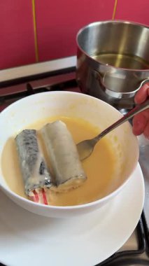 fried rolls in batter Delicious traditional Taiwanese night market snack freshly fried handmade sailfish eggrolls from Donggang, Pingtung. Seafood paste ingredients, deep-frying preparation.