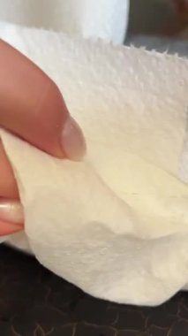 Chefs hands wipe the skin of a whole salmon fish and cut its head with his knife. Preparing sushi and Asian food. High quality 4k footage