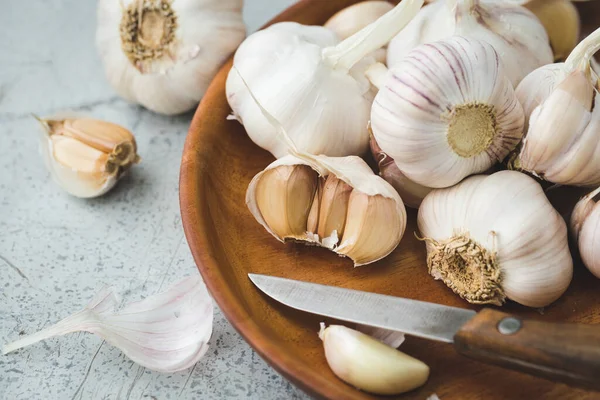 Garlic bulb- Garlic clove on the grey background