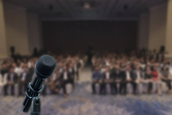 Prepare microphone ready to speak in seminar event in meeting room.