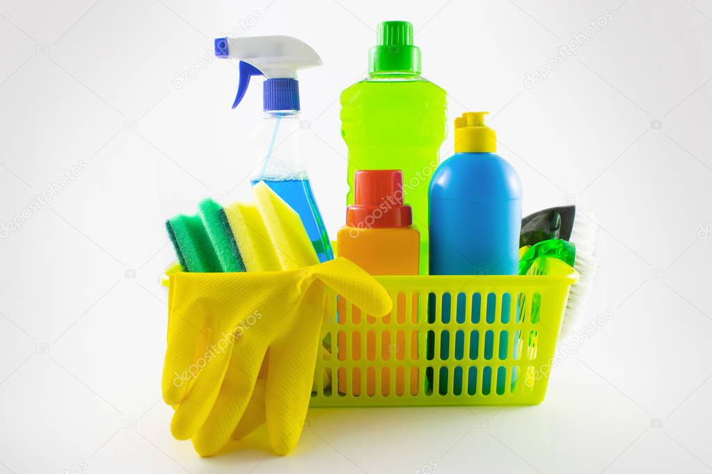 Image close-up detergent. The concept of Service for cleaning apartments and premises, cleanliness. Cleaning dust and dirt in the kitchen, on the floor, Various sanitation items, cleaning tools.