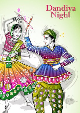 Hindistan'ın Dandiya Night Navratri Dussehra festivalinde Garba oynayan Hintli çift