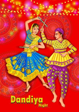 Hindistan'ın Dandiya Night Navratri Dussehra festivalinde Garba oynayan Hintli çift