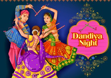 Hindistan'ın Dandiya Night Navratri Dussehra festivalinde Garba oynayan Hintli çift