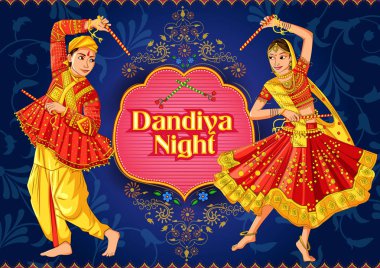 Hindistan'ın Dandiya Night Navratri Dussehra festivalinde Garba oynayan Hintli çift