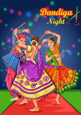 Hindistan'ın Dandiya Night Navratri Dussehra festivalinde Garba oynayan Hintli çift