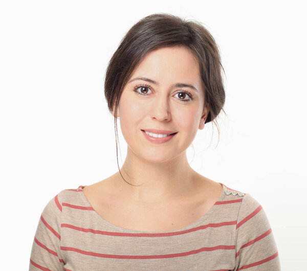 Close-up portrait of nice young woman wearing in striped blouse