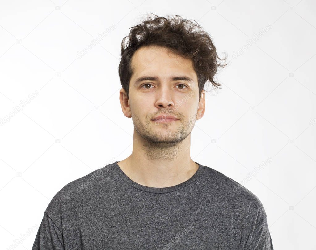 Portrait of a handsome man smiling at the camera. Isolated on white.