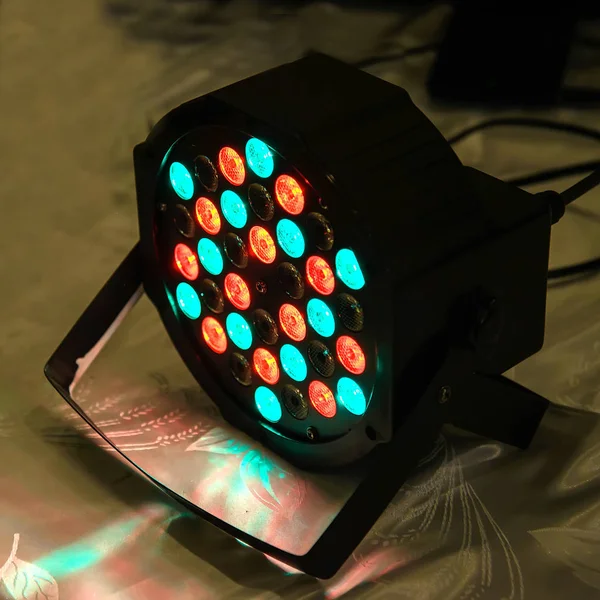 Lighting device with multi-colored disco laser projector, light show, strobe