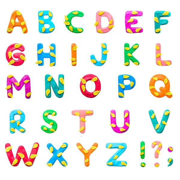 Plasticine Colored English Alphabet Autumn Theme Yellow Leaves Punctuation Marks — стоковое фото