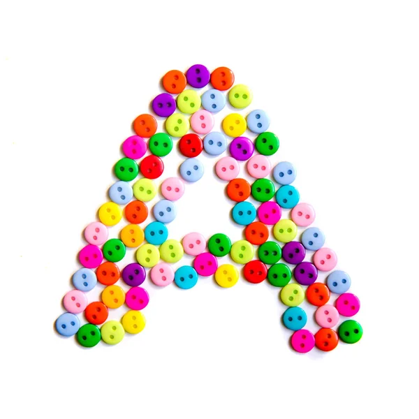 Буква "А" в английском языке сделана из разноцветных пуговиц — стоковое фото