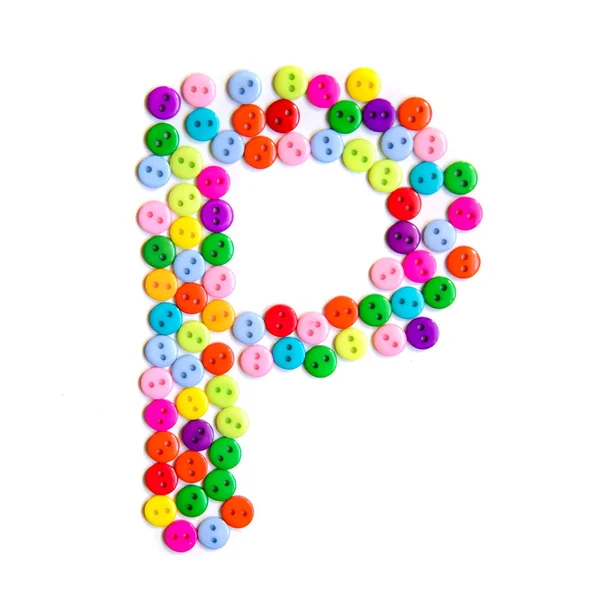 Письмо P английского алфавита из разноцветных кнопок — стоковое фото