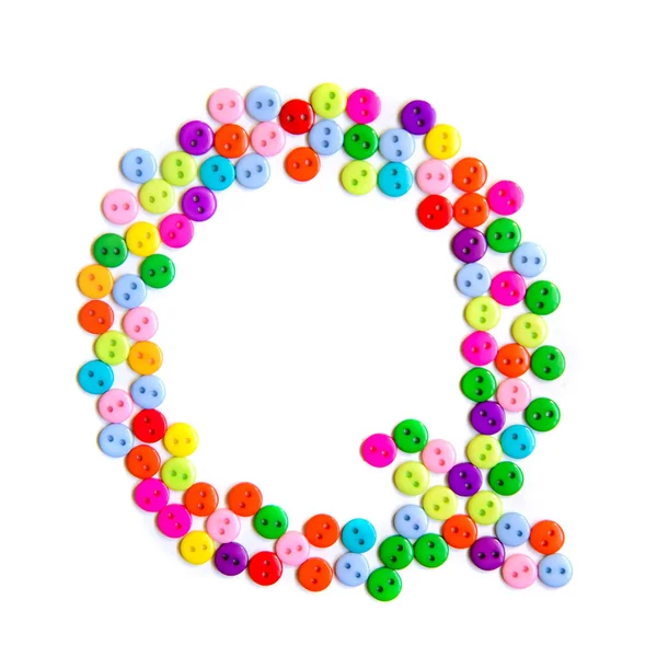 Letter Q of the English alphabet made of multi-colored buttons — Stock Photo, Image