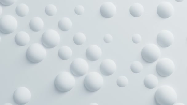 Mooie witte bollen op het oppervlak Morphing in naadloze 3d animatie. Abstracte Motion Design achtergrond. Computer gegenereerde proces. 4 k Ultra Hd 3840 x 2160. — Stockvideo