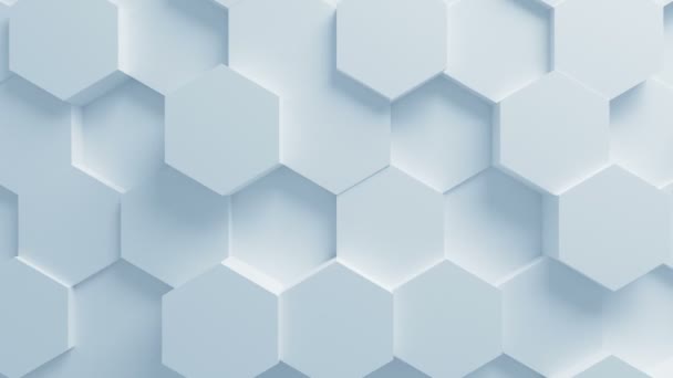 Hermosos hexágonos blancos en superficie moviéndose en animación 3d sin costuras. Resumen Motion Design Background (en inglés). Proceso generado por computadora. 4k Ultra HD 3840x2160 . — Vídeo de stock