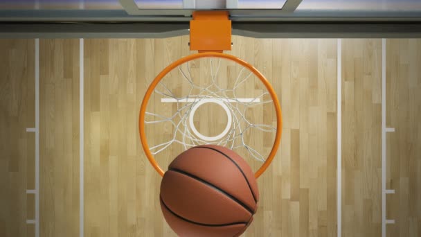 美丽的专业投掷在篮球圈慢动作的顶部视图。球飞向篮网旋转。体育概念。3d 动画4k 超高清3840x2160. — 图库视频影像