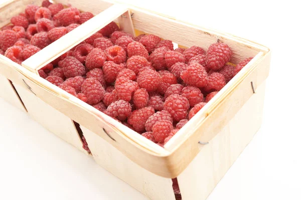 Delicious red raspberries in the basket. — Stock Photo, Image