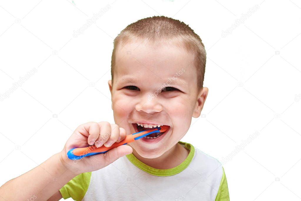 A little boy with a toothbrush.