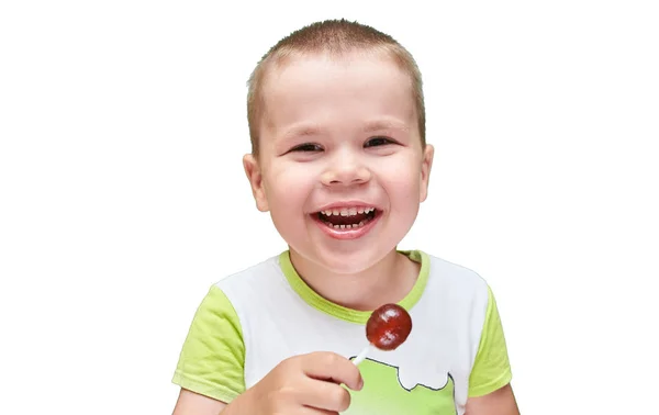 A little boy with a candy stick in his mouth. — Stock Photo, Image