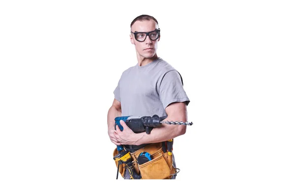 Homme, constructeur, lunettes, avec une perceuse à la main isolé sur fond blanc . — Photo