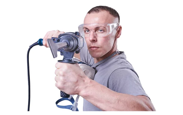 Homem, Construtor, óculos, com uma broca na mão isolada sobre fundo branco — Fotografia de Stock
