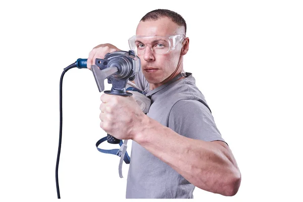 Homem, Construtor, óculos, com uma broca na mão isolada sobre fundo branco — Fotografia de Stock