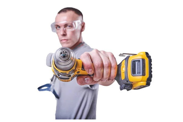 Hombre, constructor, gafas, destornillador en la mano, aislado sobre fondo blanco . — Foto de Stock