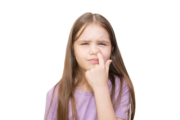 The little girl is strongly picked a nose Is isolated on a white background. — Stock Photo, Image