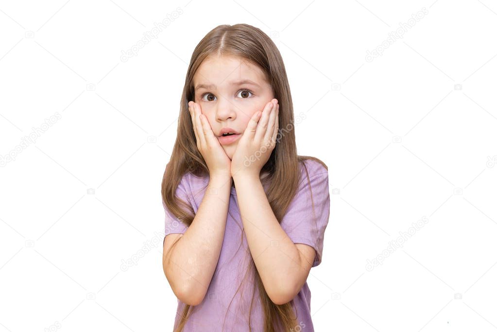 Little girl is skeptical looking up. Isolated on a white background.