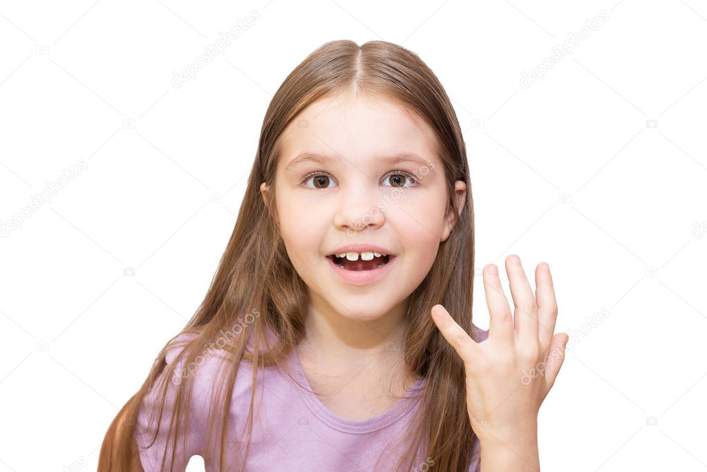 The little girl in surprise and raised her hand in bewilderment. Isolated on a white background.