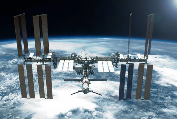 Stazione Spaziale Internazionale sul pianeta. Elementi di questa immagine sono stati forniti dalla NASA — Foto Stock