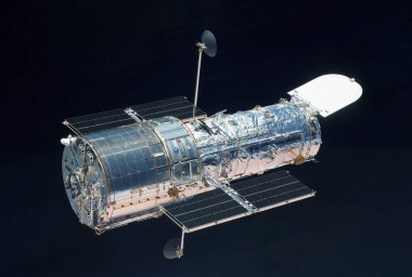 Uzay Teleskobu, karanlık bir arka plan üzerinde. Bu görüntünün unsurları Nasa tarafından döşenmiştir