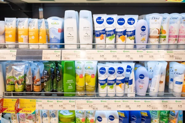 Minsk, Belarus - September 27, 2019: Counter with various hand creams in a supermarket. — Stock Photo, Image