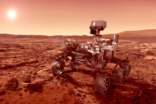 The rover explores the planet Mars, with the sun on the horizon. Elements of this image were furnished by NASA. — Stock Photo, Image