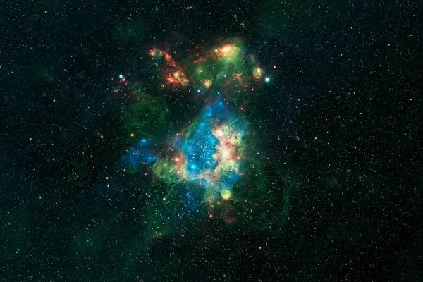 A beautiful green galaxy in deep space. Elements of this image were furnished by NASA.