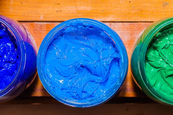 mavi renkte şeffaf cam Plastisol mürekkep pinewood tablo ekran için tee gömlek yazdırabilirsiniz. Plastisol mürekkep yararlı tee gömlek fabrika ve Sanayi expor için