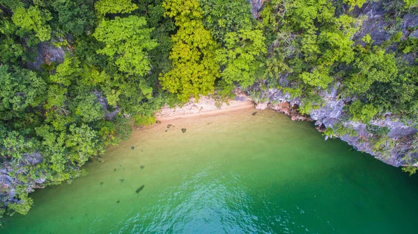 a small beach in high tide at Panak island when low tide can walk in t