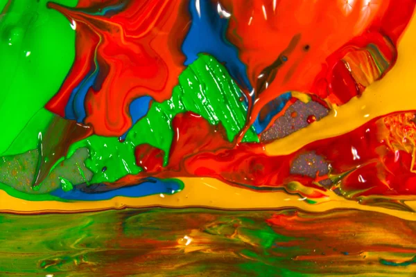 colorful of screen printing ink dropped on the ground made an abstract art