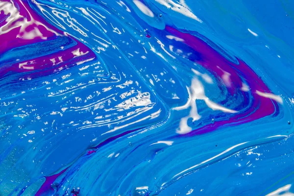 colorful of screen printing ink dropped on the ground made an abstract art