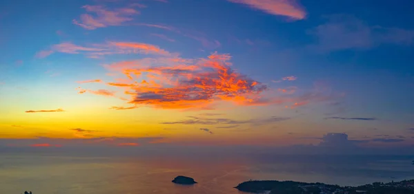 areial photography sunset above Kata beach. Pu island is in the middle of Kata beach and Karon beach