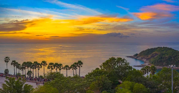 aerial photography sunset above the great lighthouse at Promthep cape Phuket Thailand