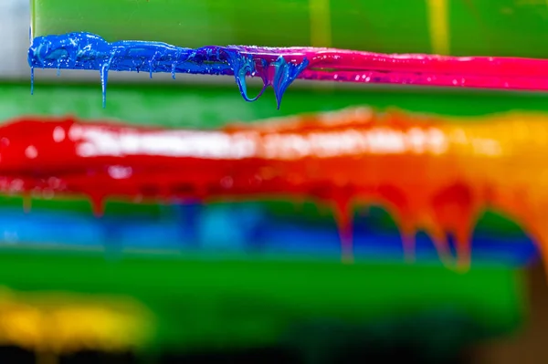 Several Dripping Colors Ink Handle Printers Tee Shirt Factory Hang — Stock Photo, Image