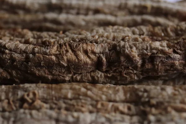 Muz kurutma işlemi. Kurutulmuş muz yığını. Makro bakış.