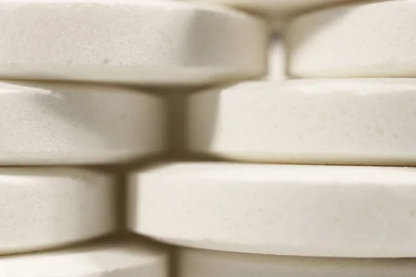 Duży Biały Lek Tabletki Stosy Apteka Pigułki Tła Makro Zbliżenie — Zdjęcie stockowe
