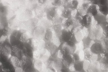 Beyaz köpük plastik doku. Soyut strafor arka plan. Makro bakış.