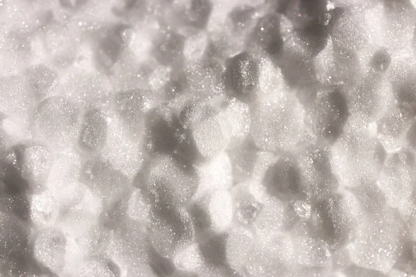 Beyaz köpük plastik doku. Soyut strafor arka plan. Makro bakış.