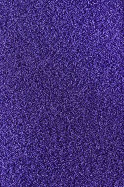 Menekşe yumuşacık malzeme doku. Mor detaylı lifleri kabarık yüzey arka plan.