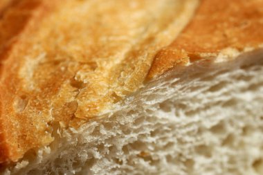 Taze Fransız baget doku rulo. Ekmek bölüm dilim kırıntı yemek arka plan. Makro bakış.