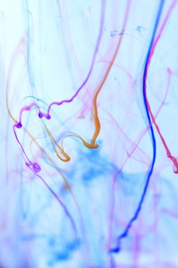 Sıvı fantezi renkli mürekkepler Art satırları. Ortam arka plan.